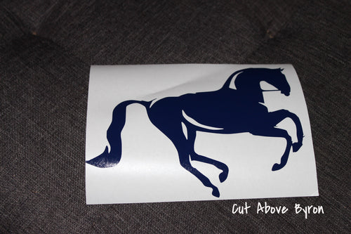Cantering navy blue horse