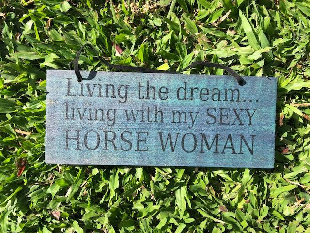 Living-the-dream-with-sexy-woman-sign