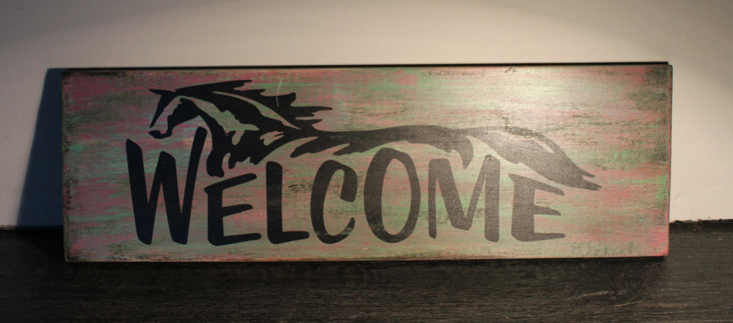 Welcome featuring horse timber sign